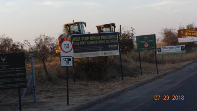 anti-poaching sign at park entrance